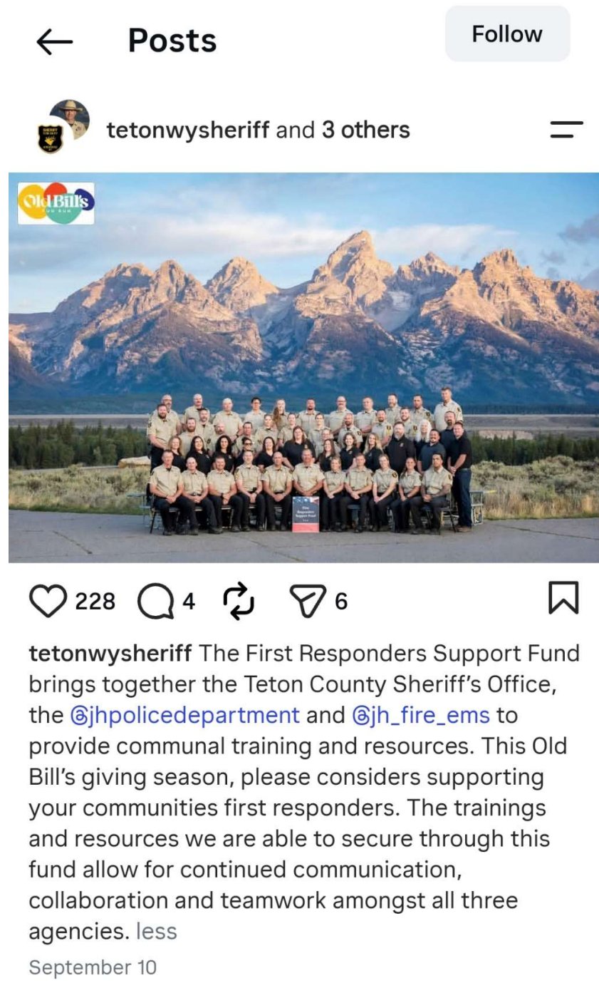 The tetonwysheriff account's September 10 post: the Sheriff's Office group photograph in front of the Tetons with a First Responders Support Fund sign at center, captioned about Old Bill's giving season, 228 likes.